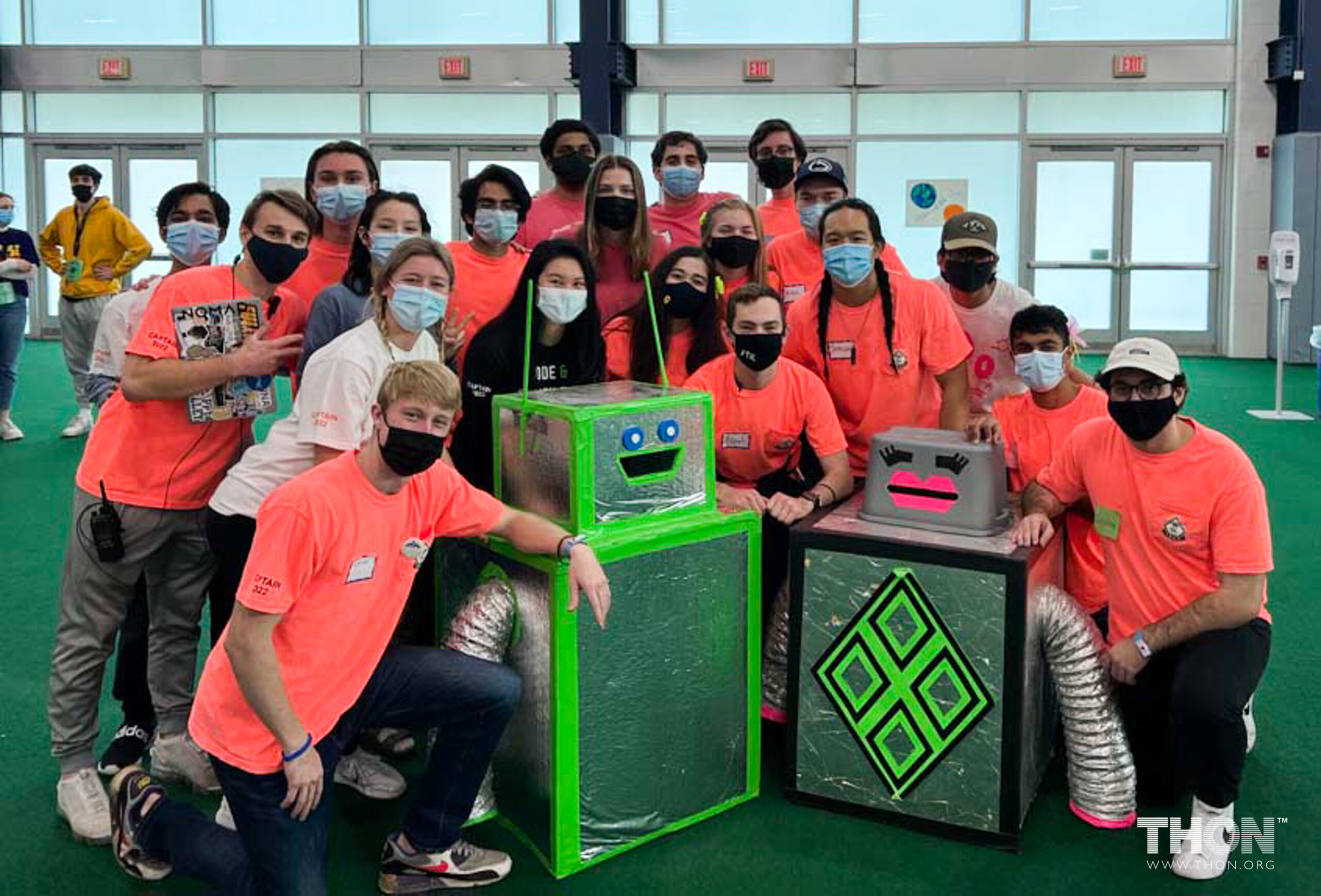 THON Technology Captains around BroBot and FemBot robot costumes